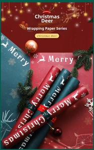 Close-up of waterproof Christmas reindeer wrapping paper in red and green festive tones