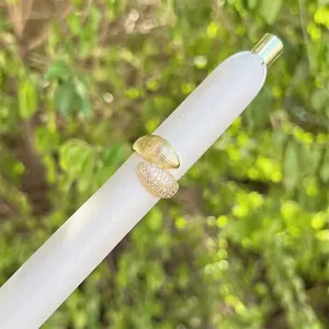18K gold plated copper open ring with textured leaf design and sparkling cubic zirconia