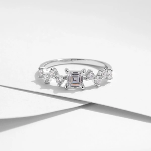 Elegant S925 sterling silver ring with emerald-cut center stone and pave accents