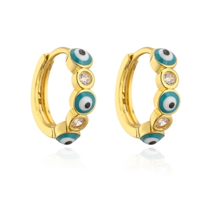 Close-up of gold-plated evil eye hoop earrings with blue enamel and zircon inlay