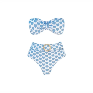 Detail of high waisted bikini with white heart print and golden ring belt buckle