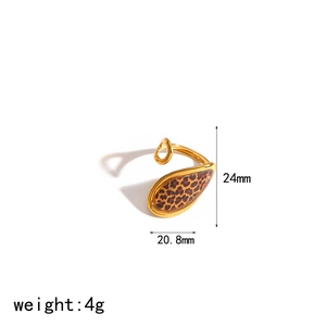 Detailed view of leopard print ring with 24mm height and 20.8mm width dimensions