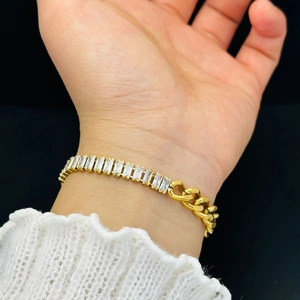 Elegant gold-plated geometric bracelet with sparkling rectangular zircons on wrist