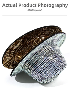 Detailed view of shimmering silver and gold rhinestones on a vintage jazz fedora hat