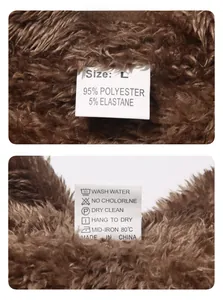 Detail of fabric label showing 95% polyester blend and care icons on brown fleece jacket