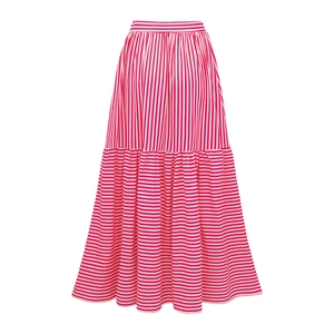 Detail of red and white striped maxi skirt with contrasting vertical and horizontal patterns