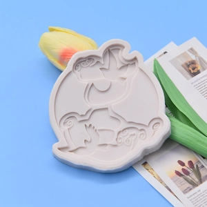 Tan silicone mold featuring a cartoon dog silhouette and clouds for DIY cake decorating