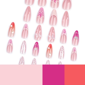 Faux ongles 3D papillon avec dégradé rose, perles et décorations florales chic