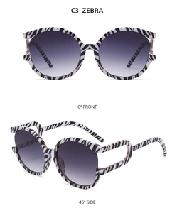 Detailed front and side views of zebra pattern sunglasses with grey gradient lenses
