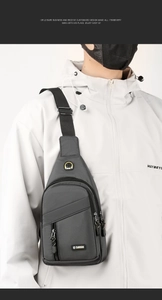 Detail view of a grey waterproof oxford chest bag worn by a model in a casual outfit