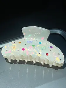 Pinza per capelli a farfalla colorata con strass, finitura iridescente e riflessi laser