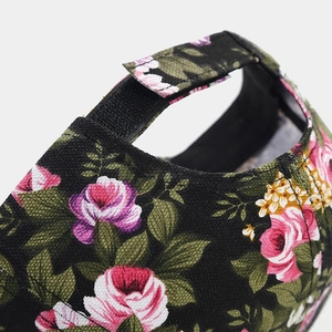 Floral canvas baseball cap with rose print and adjustable magic tape strap closure