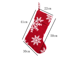 Detailed size chart of red knit Christmas stocking with white snowflake patterns