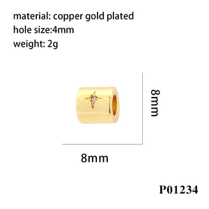 Macro detail of gold plated copper cross star bead with 8mm diameter and 4mm hole size