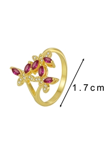 Detail view of gold butterfly ring with ruby zircons and 1.7cm diameter size mark