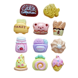 Set of 11 colorful resin food charms featuring mini toast, cake, and sweet biscuit shapes