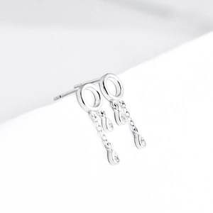 Silver drop tassel earrings with sparkling round crystals and teardrop pendants