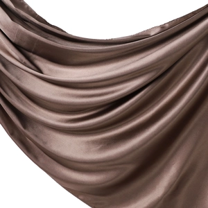 Glossy bronze satin scarf with smooth silk texture and elegant draping folds