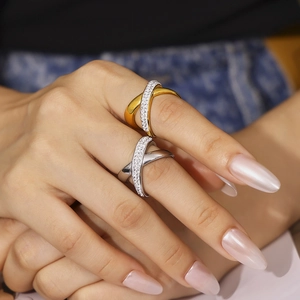 Cross-shaped 18k gold plated titanium steel ring with sparkling pavé diamonds for women