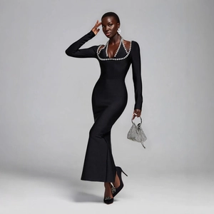 Elegant black long sleeve V-neck evening gown with crystal beaded trim and mermaid hemline