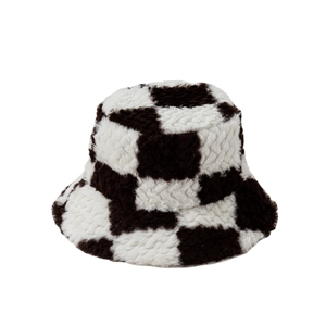Plush checkerboard bucket hat in black and white faux fur for winter warmth