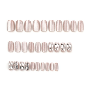 Champagne pink cat eye press-on nails with luxury rhinestones and square oval shape