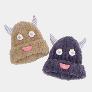 Whimsical monster knit beanies with horns and large eyes in purple and khaki plush fabric