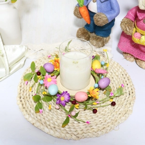 Easter egg floral wreath candle holder with colorful eggs and spring flowers for table decor