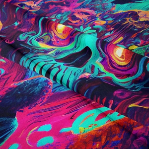 Detail shot of psychedelic fluid art tapestry showing fine diagonal weave texture and vibrant colors