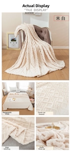 Close-up of cream white flannel blanket featuring 3D jacquard texture and neat hemmed edges