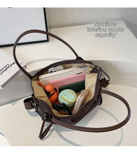 Interior view showing large capacity of the brown nylon tote bag for daily essentials
