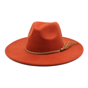 Classic wide brim orange fedora hat with brown braided belt and tassel detail
