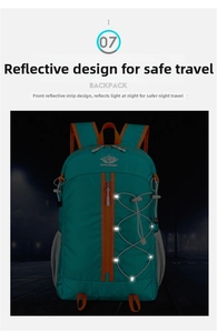 Detail of high-visibility reflective elements on green outdoor backpack for night safety