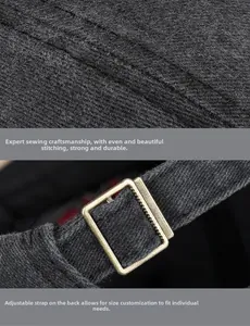Close-up of fine stitching and metal adjustable buckle on dark grey cotton baseball cap