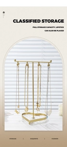 Golden jewelry stand with T-bar hooks and heart-shaped base for necklaces and storage