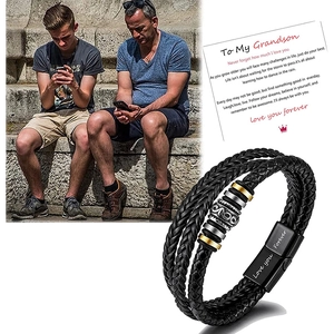 Macro detail of braided leather bracelet with Love you Forever engraving and message card