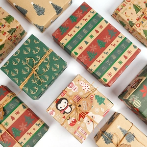 3M Christmas Kraft wrapping paper rolls featuring reindeer, trees and festive holiday patterns