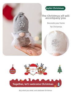 Detail view of a plush Christmas gnome ornament with a silver sequin snowflake grey knit cap
