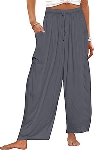 Detail of dark grey wide leg cotton pants featuring elastic drawstring waist and side pockets