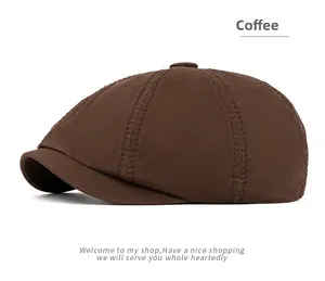 Close-up of retro dark coffee cotton newsboy cap with neat stitching and short brim