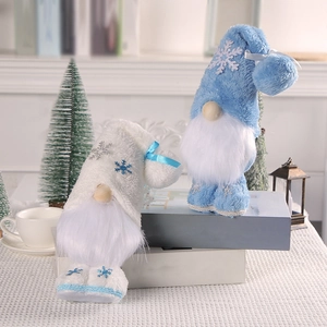Handcrafted standing Christmas gnome plush set with snowflake hats in cozy home setting