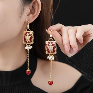 Vintage gold drop earrings with red enamel star flower and long tassel pearls