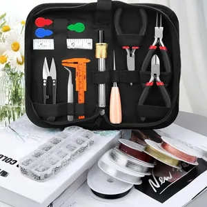 Macro view of DIY jewelry making tool kit with various pliers and beading accessories