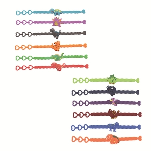 Detailed view of colorful dinosaur silicone wristbands for children in various patterns