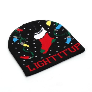 Black Christmas beanie with festive sock pattern and Light It Up text embroidery
