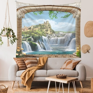 Scenic tapestry with castle and waterfall displayed as a backdrop over a living room sofa