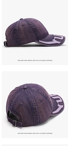Detail view of purple washed denim baseball cap with vintage finish and metal buckle