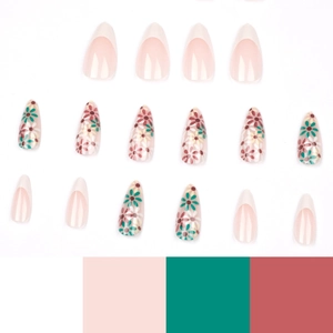 Faux ongles amande avec pointes françaises et motifs floraux de marguerites rouges et vertes
