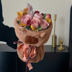 Christmas plush bear flower bouquet wrap with pink roses and elegant silk bow tie