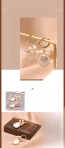 Macro detail of Baroque pearl earrings with 18K gold-plated copper and small beads